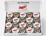 An open white Pablo Exclusivo 20-pack box containing 20 small round nicotine pods with various colored labels, displayed on a clean white background.